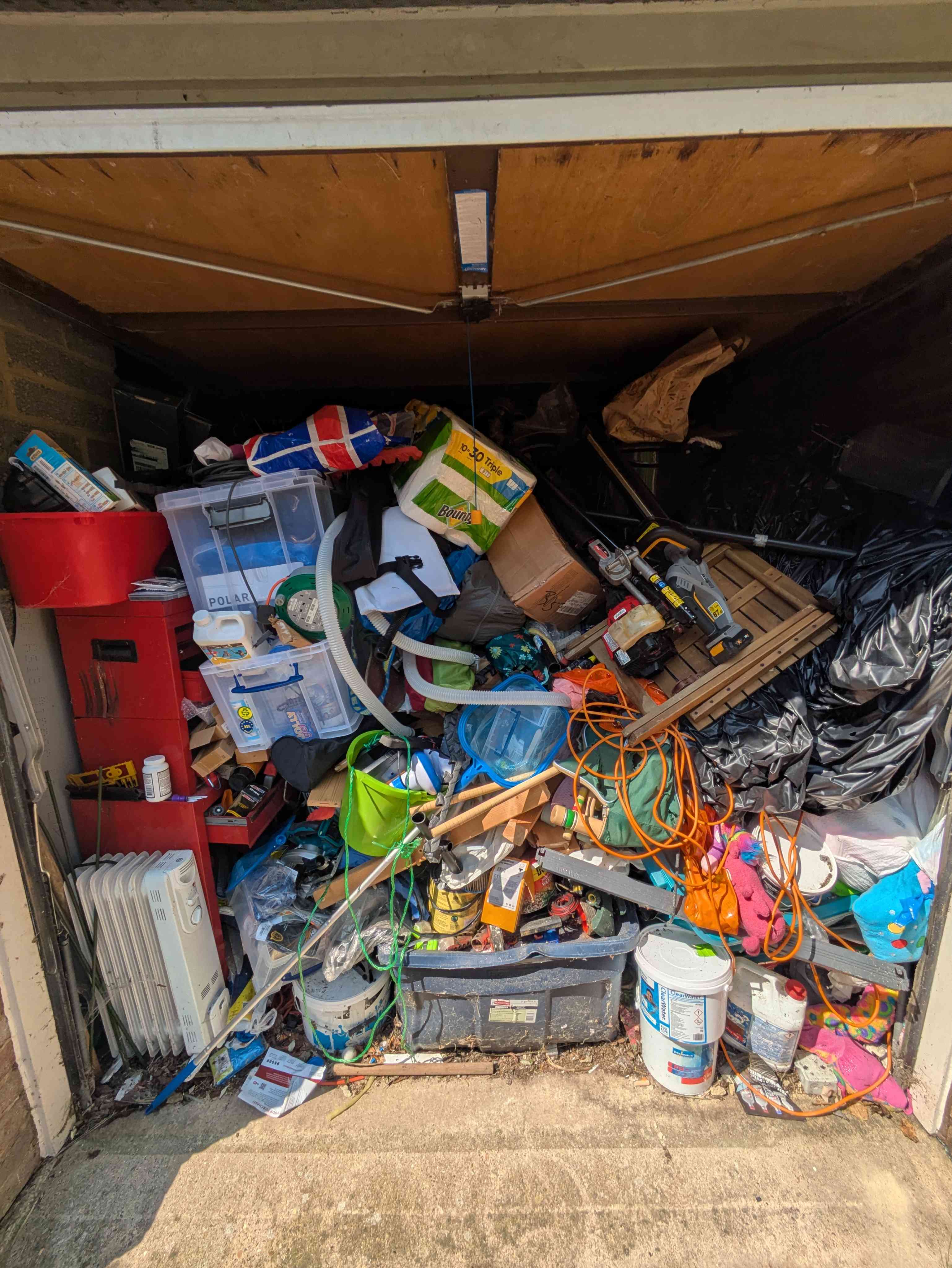 The same garage from a different angle, showing the second wall packed equally tight